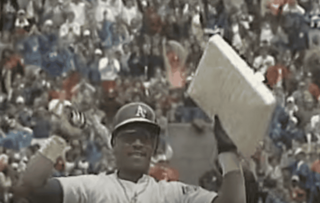 Image of Rickey Henderson, showcasing his speed and skill as a left fielder.